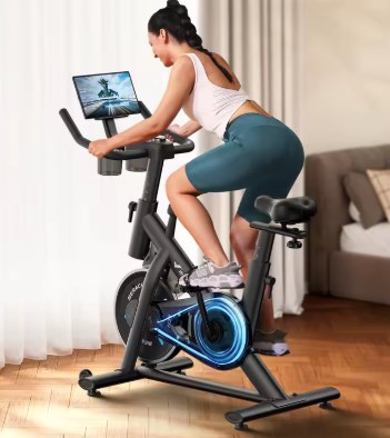 chollo MERACH Bicicleta Spinning con Monitor LED App Propia, Capacidad de 122 kg, Entrenamiento Aeróbico